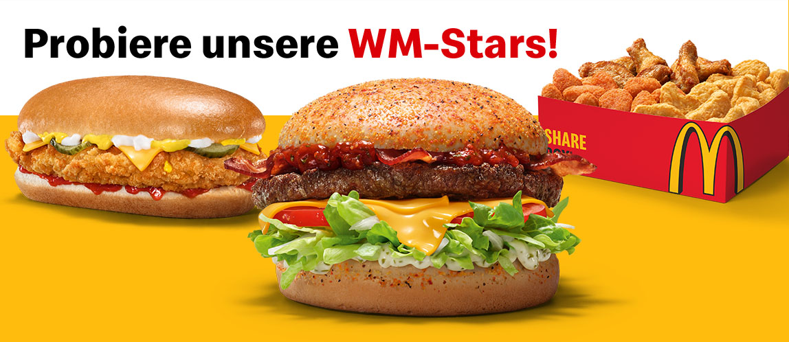 Unter dem Slogan 'Probiere unsere WM-Stars!' zu sehen die Produkte Deutschlandburger, die Sharebox® und der Crispy Chicken Dog.